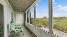 Beachfront Apartment with Screened Porch & Deck - Image 3