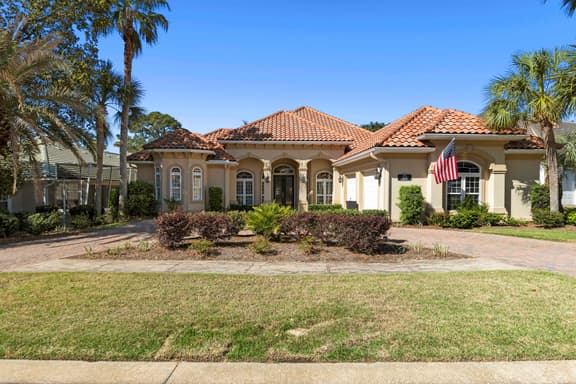 Mediterranean Home with Club Amenities & Golf Cart - Image 1